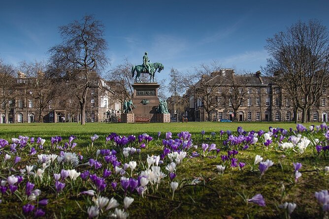 Edinburgh: Dean Village & New Town Walking Tour - George Street to The Dome: statues, cafes, and Neoclassical detail