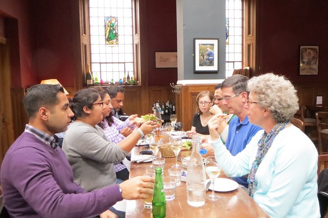 Edinburgh Food & Drink Tour with EatWalk Tours - Grassmarket stop, where food and drink explain the neighborhood