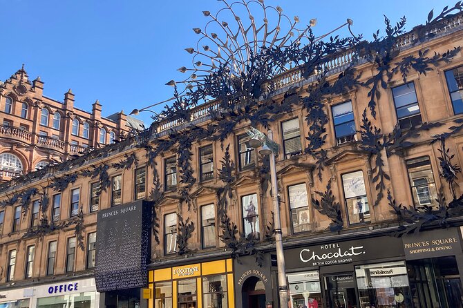 Fun and Flexible Treasure Hunt Around Glasgow with Cryptic Clues - Argyll Arcade, Tolbooth Steeple, and Mercat Cross: shopfront clues and street-level details