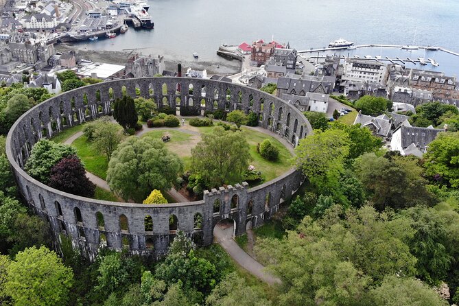 Glasgow: Glencoe & Oban Privately Guided Day Tour in Luxury MPV - Luss and the Ben Lomond pier photo moment