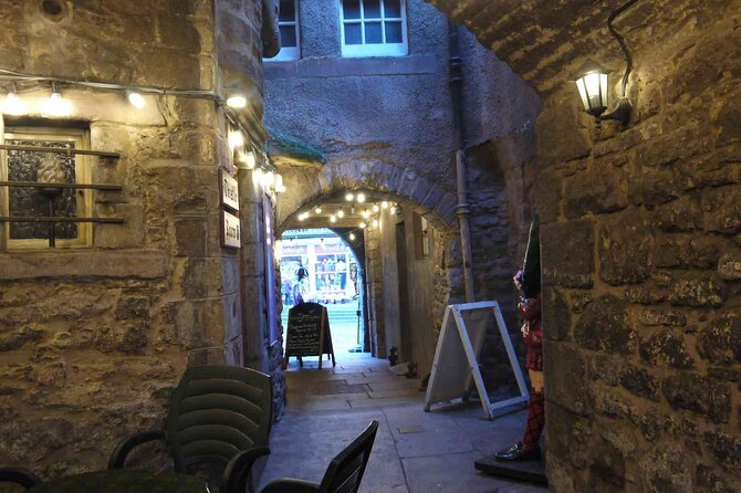 Highlights from the Royal Mile: A Self-Guided Audio Tour - Mercat Cross area tales, and punishments that make the past feel real