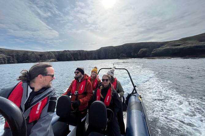 Northern Islands RIB Tour - Eilean Nan Ron: sea caves, colored rocks, and a tunnel-arch moment