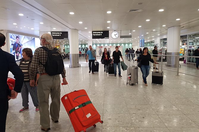Private Airport transfer From or to Edinburgh airport (One way transfer) - Pickup at Edinburgh Airport: sign, arrivals hall, and the Black Sheep Coffee note
