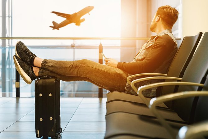 Private Glasgow Arrival Transfer - Airport to Hotel / Accommodation - Meeting your driver after Customs, name board and arrivals barrier
