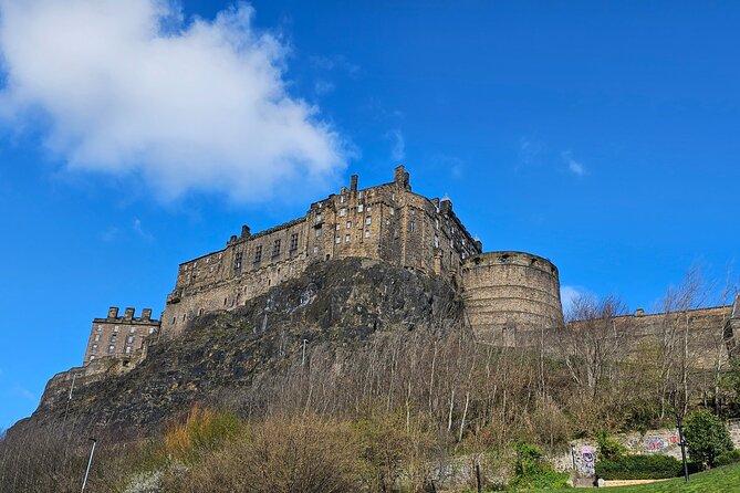 Privately Guided Day Tour of Edinburgh in Luxury Minivan - Holyroodhouse: up close royal architecture, with tickets to plan for