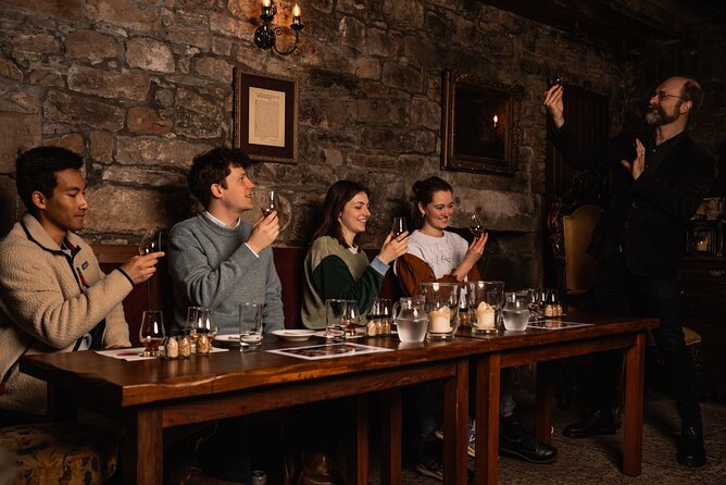Small Group Edinburgh Whisky Tour and Tasting - Entering Edinburgh’s Old Town at Mercat Cross