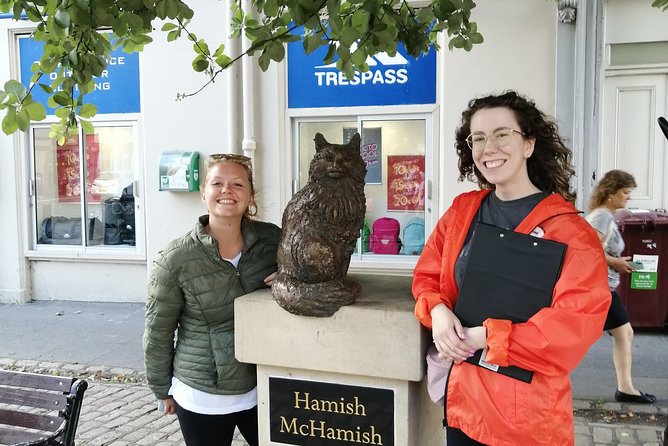 St Andrews Must-Sees Daily Walking Tour (11am & 2pm) - The cat statue moment: a quick break from heavy history